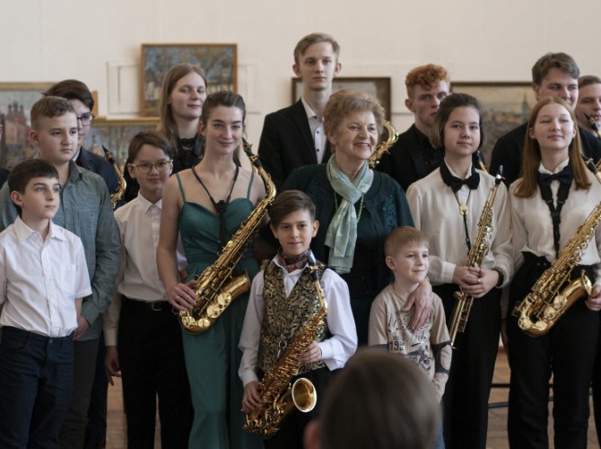 Group of competition participants with saxophones